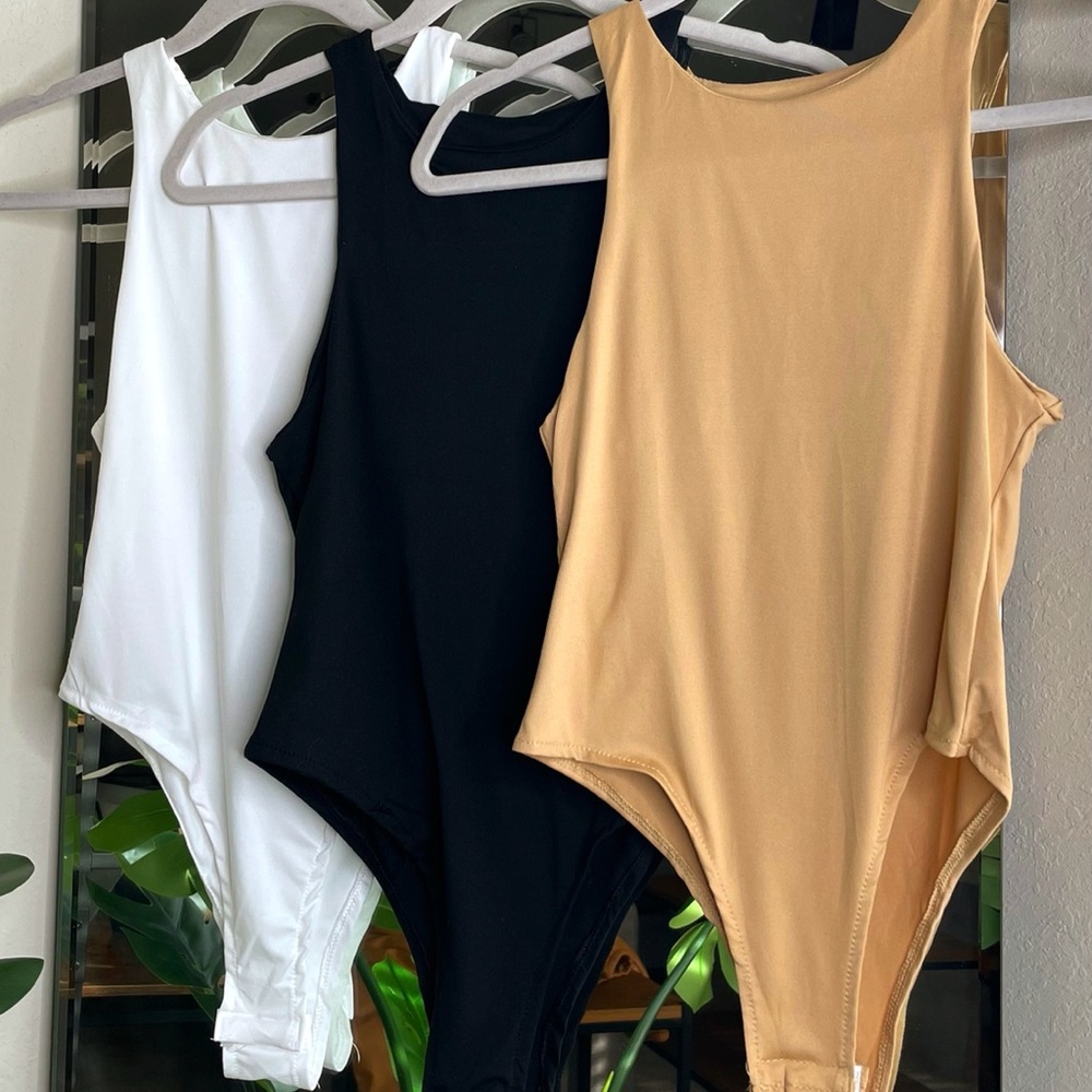 High Neck Bodysuit. NWT.